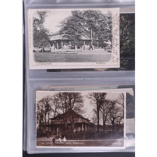 1381 - A large collection of antique and vintage Preston Park and Brighton interest postcards contained in ... 