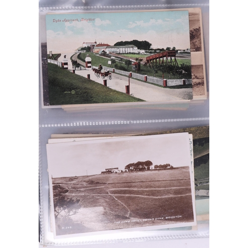 1381 - A large collection of antique and vintage Preston Park and Brighton interest postcards contained in ... 