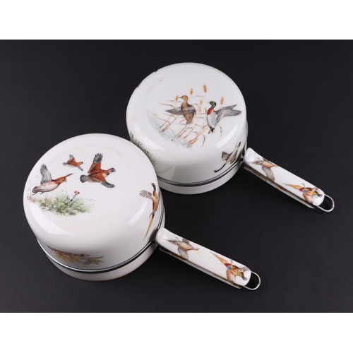 1387 - A pair of French ceramic saucepans decorated game birds, retailed by Asprey of London  17cm diameter... 