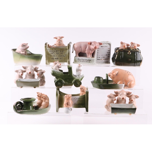 1393 - A large group of late 19th century pig fairings, various models including locomotive, bus, photograp... 