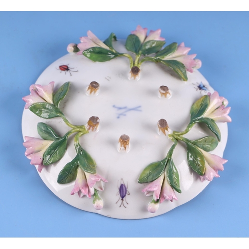 1394 - A 19th century Meissen flower encrusted cabinet cup and saucer.