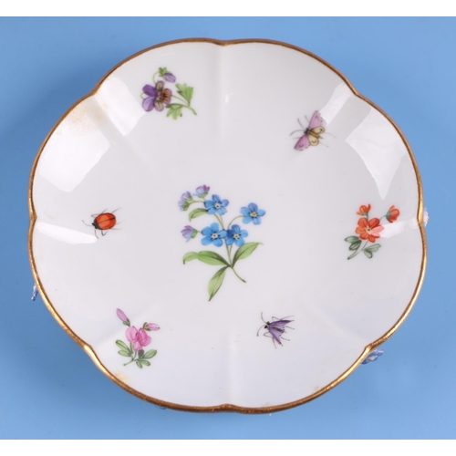 1395 - A 19th century Meissen flower encrusted cabinet cup and saucer.