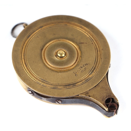 1412 - A 19th century brass percussion cap capper / loader, signed 'JS Improved', 5cms diameter.