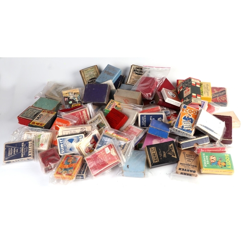 142 - A large quantity of various antique and novelty playing cards and card games, including The Counties... 