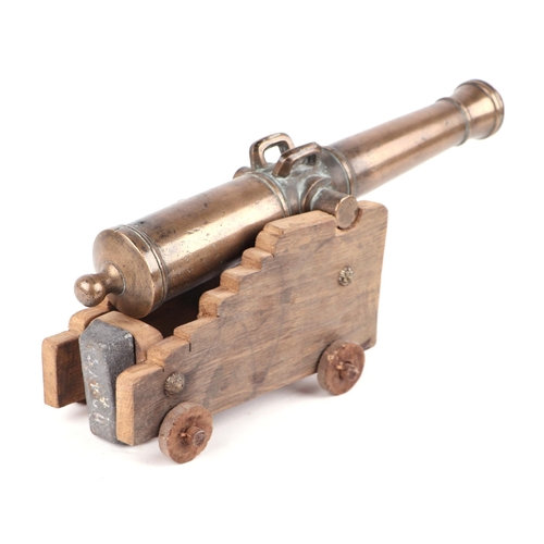 1425 - 17th century French bronze signal cannon on a later wooden carriage and wheels. Overall barrel lengt... 