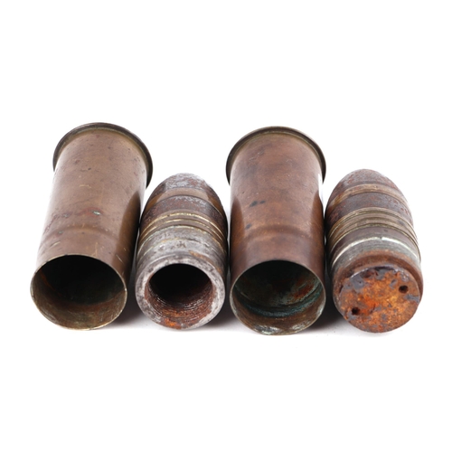 1435 - Two complete inert WWI Naval artillery shells and brass casings in two parts. Various stamp to the b... 