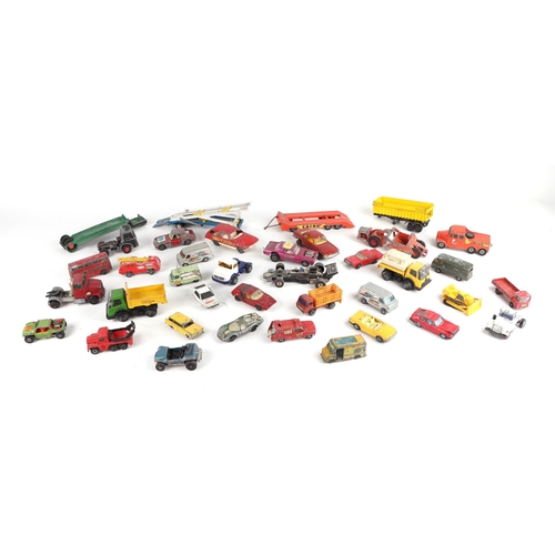 144 - A quantity of assorted diecast vehicles to include Corgi 007 Lotus Esprit, MGB GT, Matchbox Mercedes... 