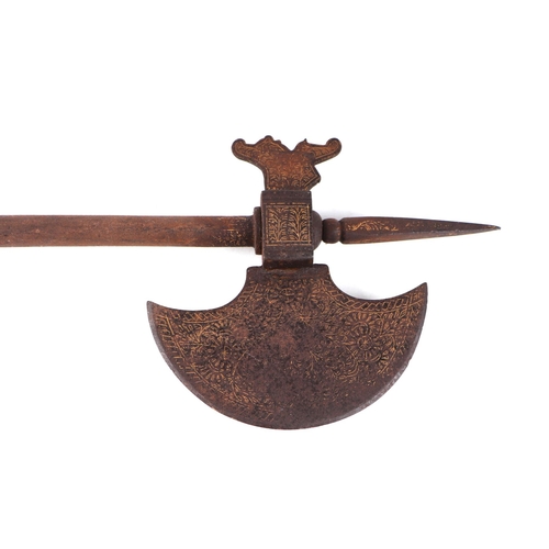 1449 - An Indo-Persian ceremonial Orr steel axe, with vestiges of gold koftgari inlay decoration, the shaft... 