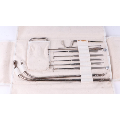 1490 - A vintage German Berco surgeons kit, possibly military, with five layers of surgeons instruments, so... 