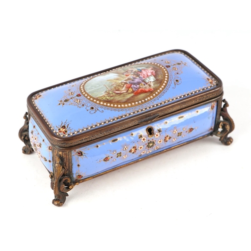 1574 - A 19th century French enamel and ormolu mounted trinket box with blue ground and jewelling, the top ... 