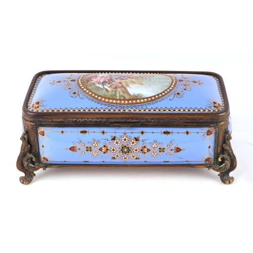 1574 - A 19th century French enamel and ormolu mounted trinket box with blue ground and jewelling, the top ... 