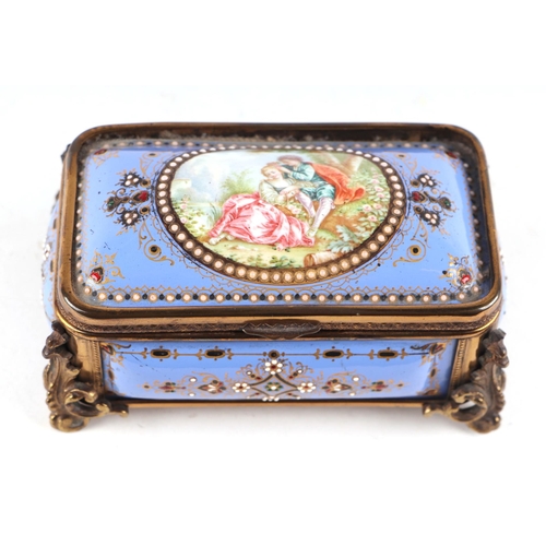 1575 - A 19th century French enamel and ormolu mounted trinket box with blue ground and jewelling, the top ... 