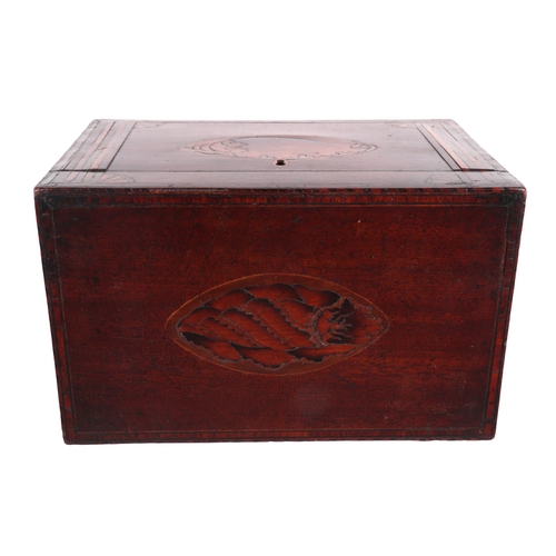 1579 - A Georgian mahogany tea caddy inlaid with conus patae to the lid and the front, 21cms wide.