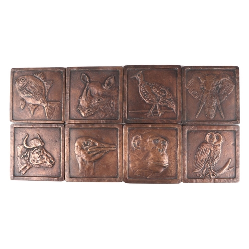 1580 - A group of cast bronze plaques depicting various animals and birds to include elephant, rhinoceros a... 