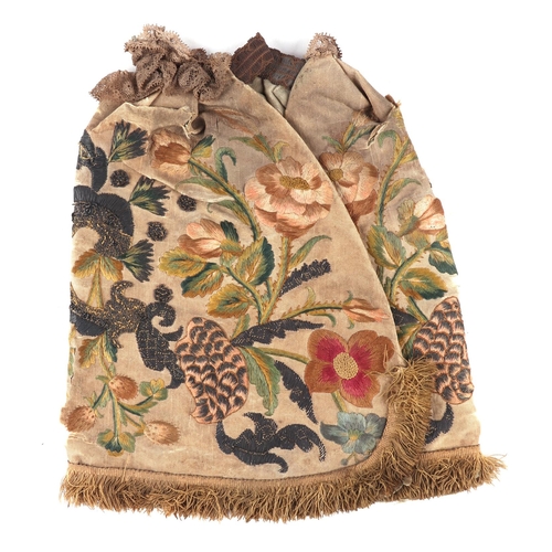 1582 - A mid 17th century English embroidered hat decorated with flowers and silver wire.