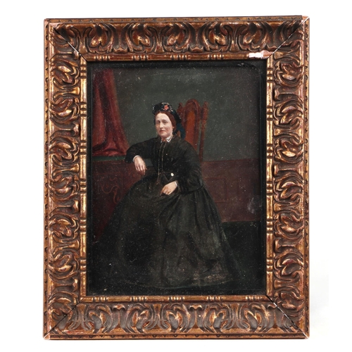 159 - A Victorian overpainted print depicting a lady in mourning dress, 17 by 21cms, framed & glazed.