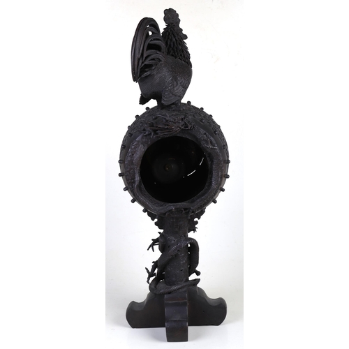 1684 - A large Japanese bronze mantel clock on coiled dragon column and having a cockerel finial, the white... 