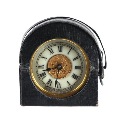 1688 - An earl 20th century American travelling alarm clock, the enamel chapter ring with Roman numerals, f... 