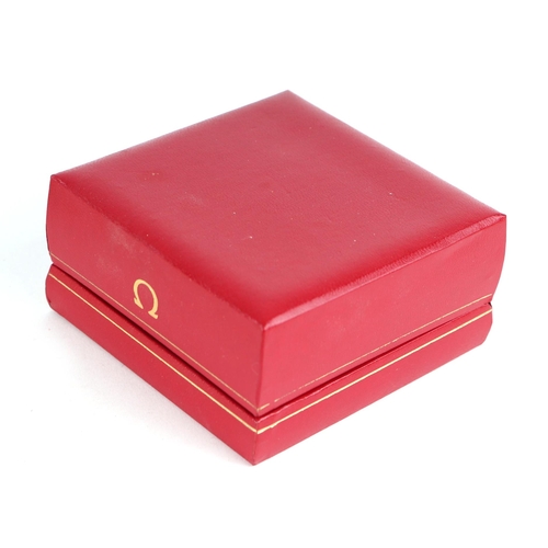 1695 - A 1965 red leather Omega box with guarantee and outer cardboard box.