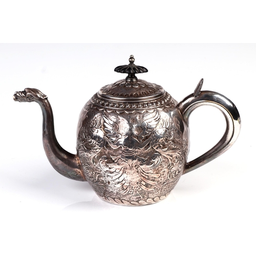 1720 - An 18th century Dutch white metal armorial Batchelors teapot, impressed makers mark to the underside... 