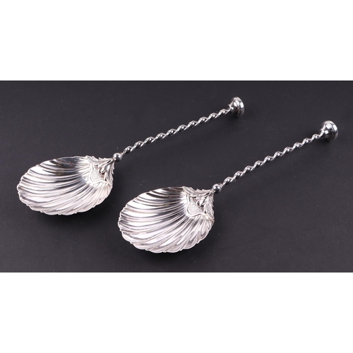 1726 - A pair of Victorian Mappin & Webb silver spoons with shell shaped bowls, London 1899, 21cms long, 12... 