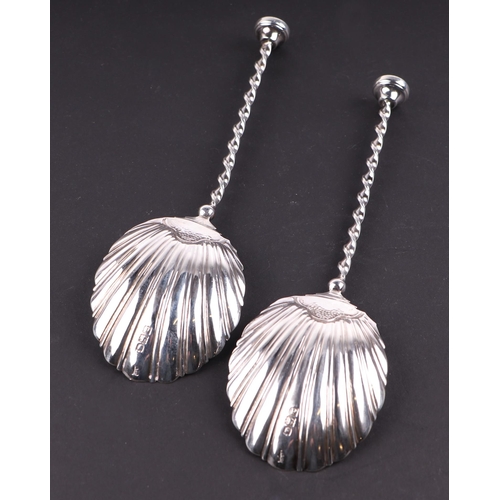 1726 - A pair of Victorian Mappin & Webb silver spoons with shell shaped bowls, London 1899, 21cms long, 12... 