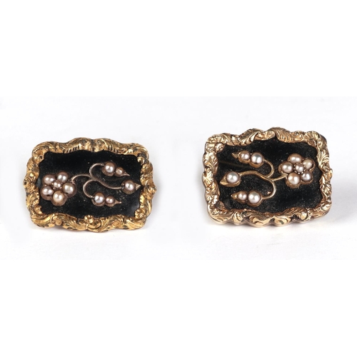 1818 - A pair of George III yellow metal and black enamel memorial brooches set with pearls, later converte... 