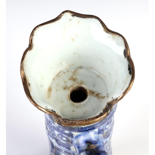 1956 - A Chinese blue and white ewer of cylindrical form decorated dragons with blue seal mark to the under... 