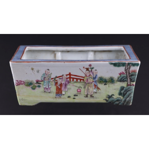 1968 - A Chinese famille rose rectangular planter decorated with figures in a landscape, seal mark to the u... 