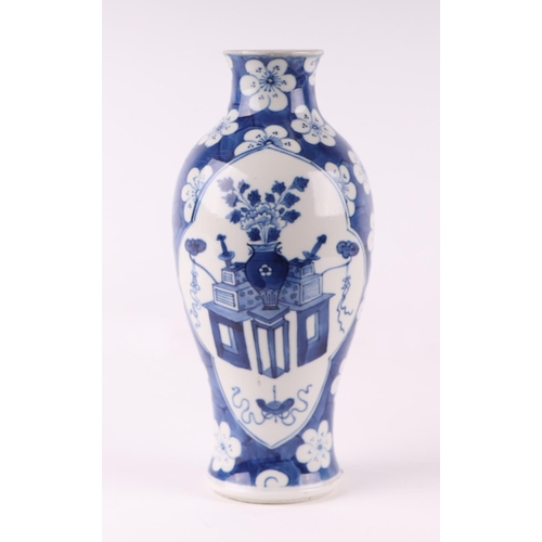 1977 - A Chinese blue & white vase decorated with precious objects on a cracked ice prunus ground, six char... 