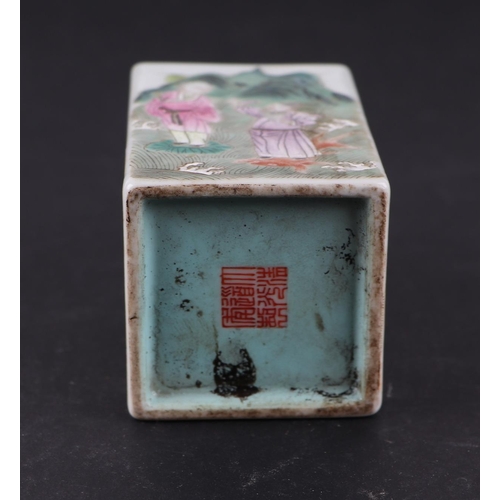 1978 - A Chinese famille rose square form brush pot decorated figures within a landscape, red seal mark to ... 