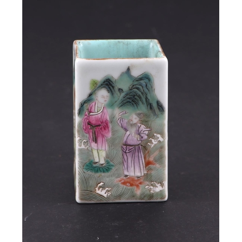 1978 - A Chinese famille rose square form brush pot decorated figures within a landscape, red seal mark to ... 