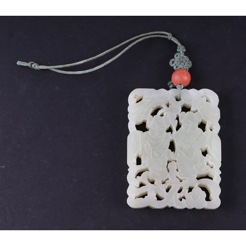 1982 - A Chinese pierced jade pendant, 5 by 6.5cms.