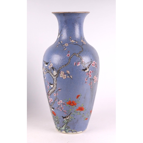 1986 - A large Chinese vase decorated with magpies and prunus on a blue sgraffito ground, red seal mark to ... 