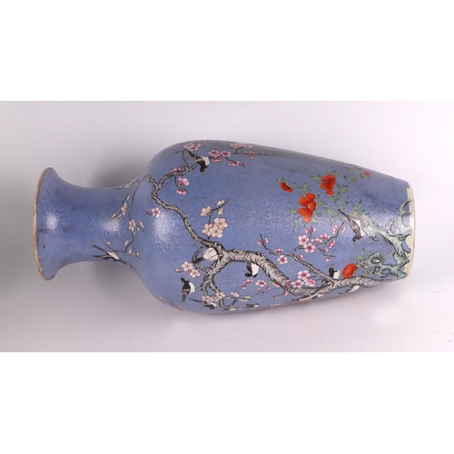 1986 - A large Chinese vase decorated with magpies and prunus on a blue sgraffito ground, red seal mark to ... 