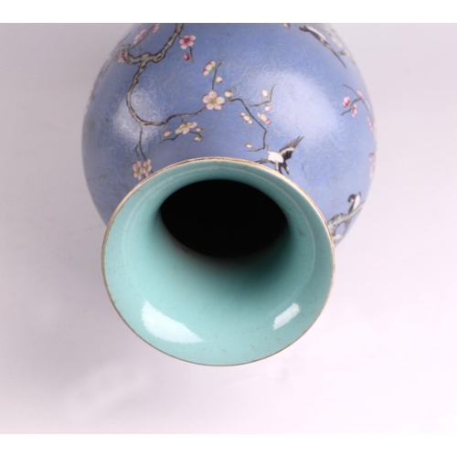 1986 - A large Chinese vase decorated with magpies and prunus on a blue sgraffito ground, red seal mark to ... 