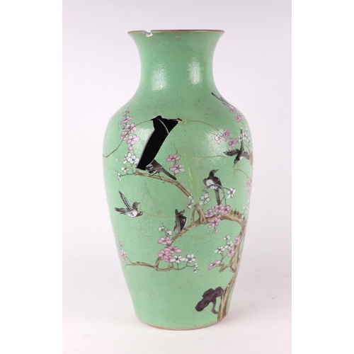 1986 - A large Chinese vase decorated with magpies and prunus on a blue sgraffito ground, red seal mark to ... 