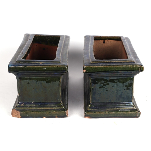 2 - A pair of green glazed terracotta planters, each 34cm wide, (2)