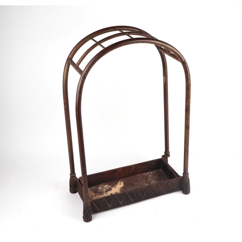 2005 - An unusual country house domed brass and iron stick stand of eight divisions, with a selection of ho... 