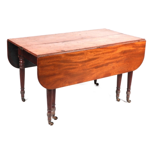 2013 - A 19th century mahogany drop-leaf extending dining table in the Waring & Gillow style, inset with tw... 