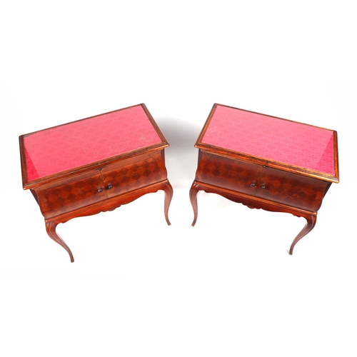 2014 - A pair of French bedside cabinets, possibly fruitwood, the rectangular top above a brushing slide wi... 