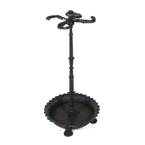 2016 - A Victorian cast iron four-division stick stand on lion paw feet, 80cms high.