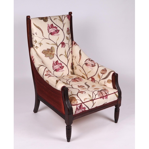 2059 - An Edwardian walnut framed upholstered armchair.