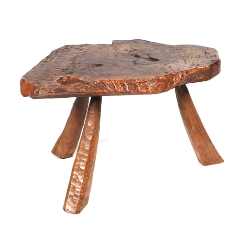 2061 - A rustic elm small side table on tapering legs, 73cms wide.