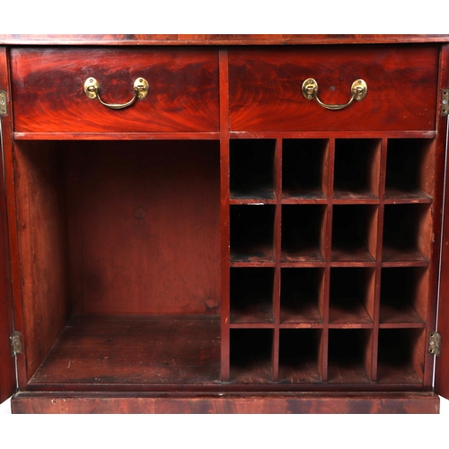 2080 - A Victorian mahogany cabinet, the pair of fielded panelled doors enclosing a fitted interior of two ... 