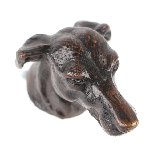 227 - A bronze study of a dogs head, 10cms long.