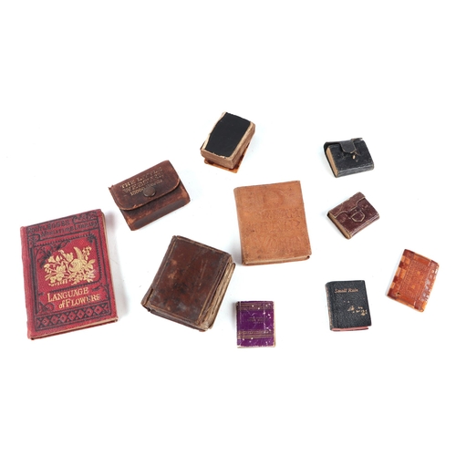 250 - A collection of miniature books including two antique bibles and three copies of Small Rain Under Te... 