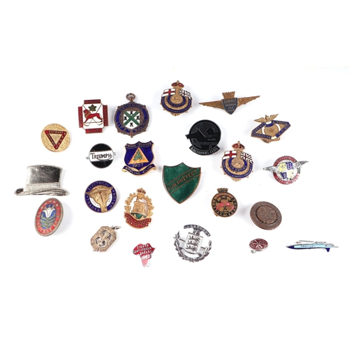 251 - A quantity of enamel badges to include a silver Scout badge.