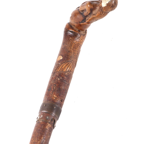 255 - A treen walking stick, the handle carved in the form of a mermaid, 82cms long; together with a surve... 