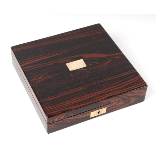 285 - A 19th century coromandel watch box, 17cms wide.